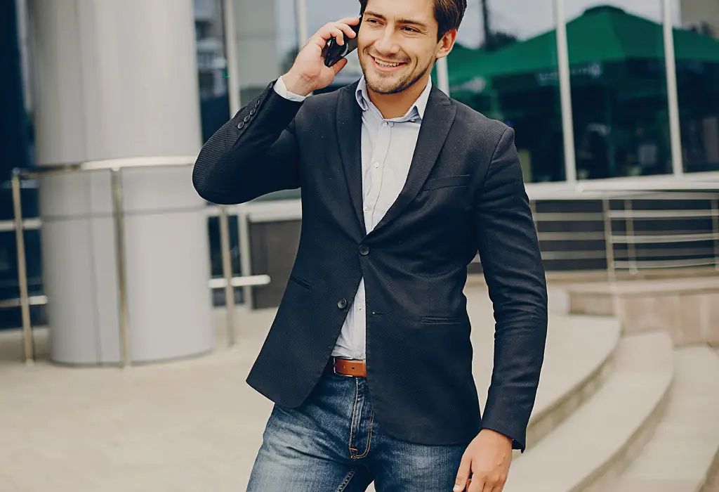 Man wearing jeans and sports jacket 