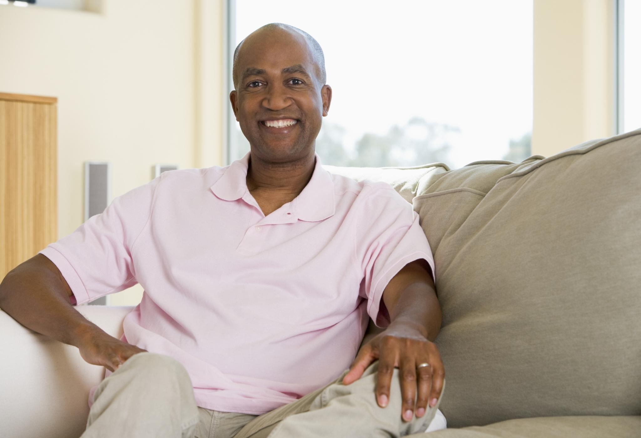 attractive older men sitting on the coach