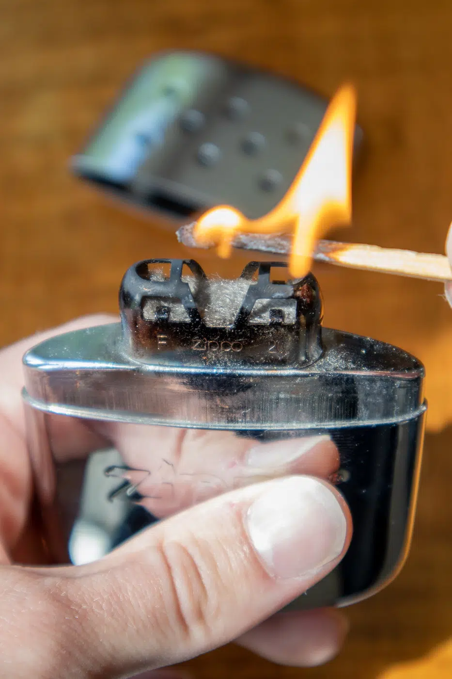 Zippo Hand Warmer lighting with match