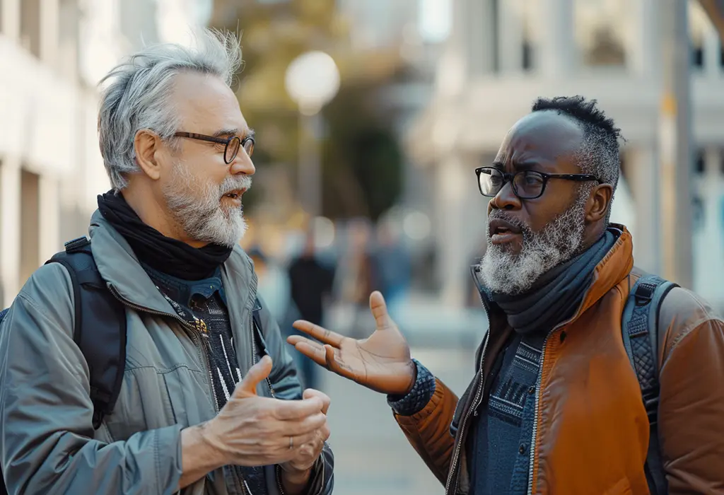 two men having a calm disagreement over a conversation