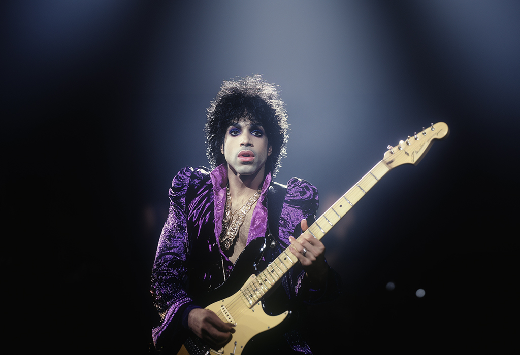 prince singer with guitar