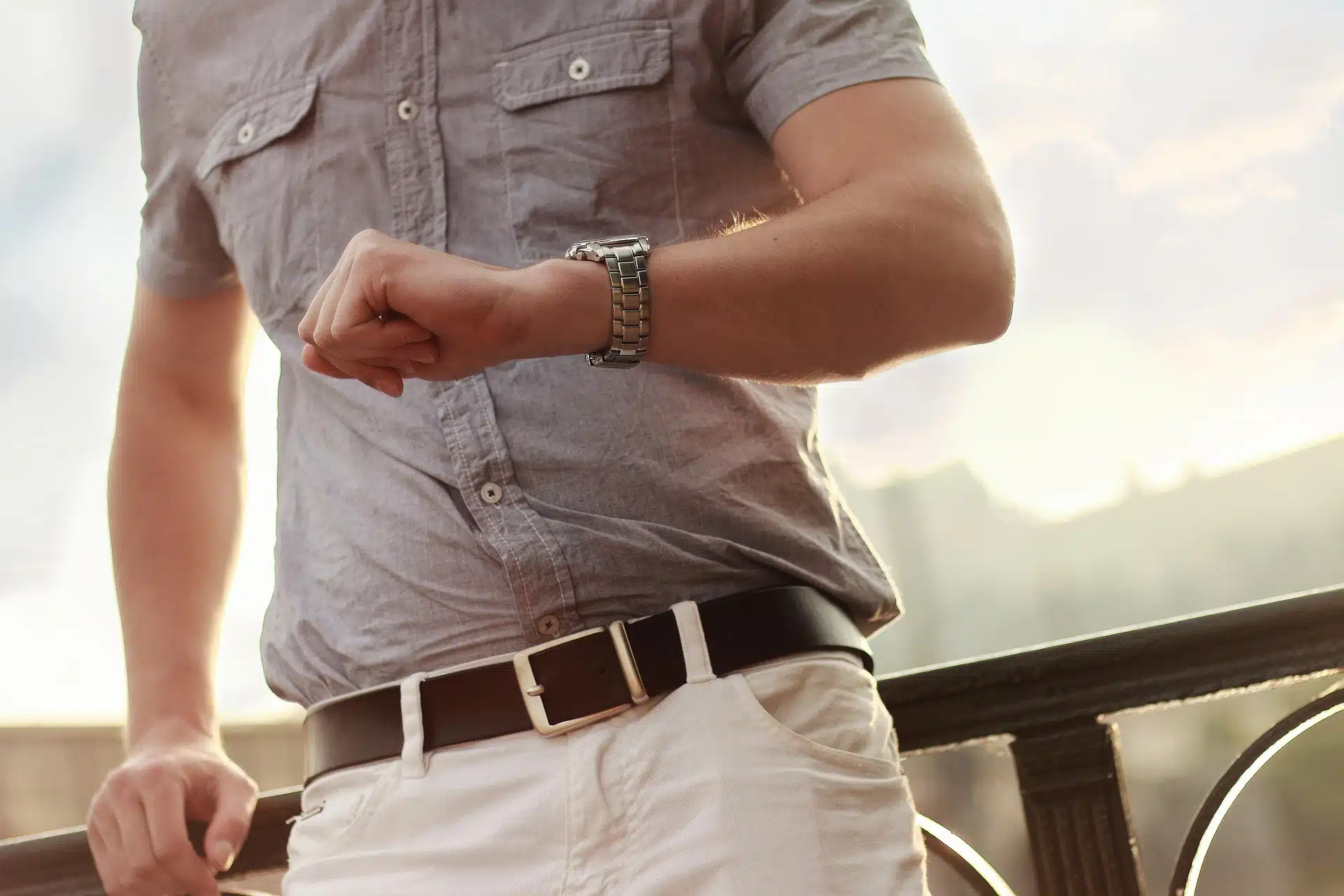 Person checking the time on their wristwatch.