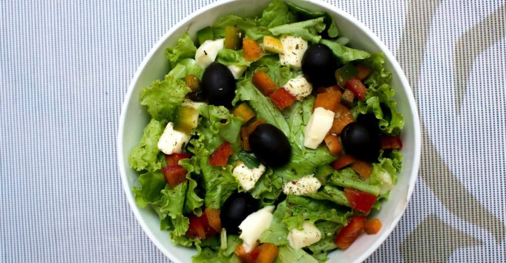 Bowl of Vegetable and Cheese Salad.