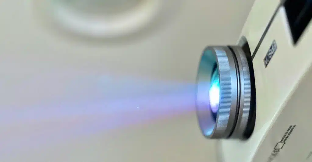 Projector lens showing a light beam.