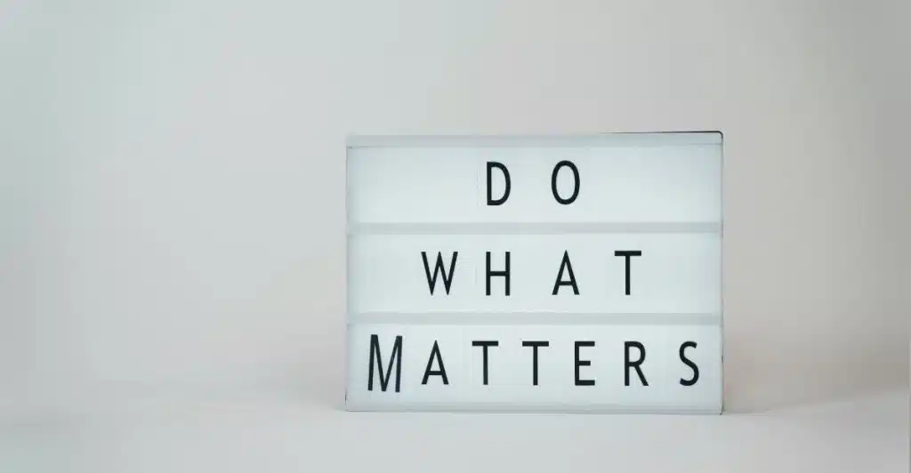 A light box sign on a white background displaying the words "DO WHAT MATTERS."