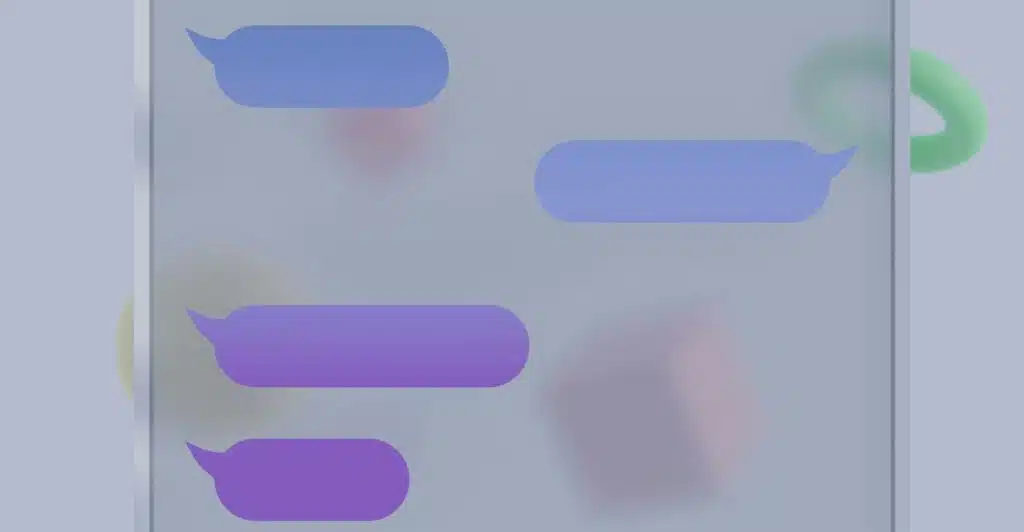 Abstract image showing several chat bubbles in different shades of purple and blue on a blurry, light background