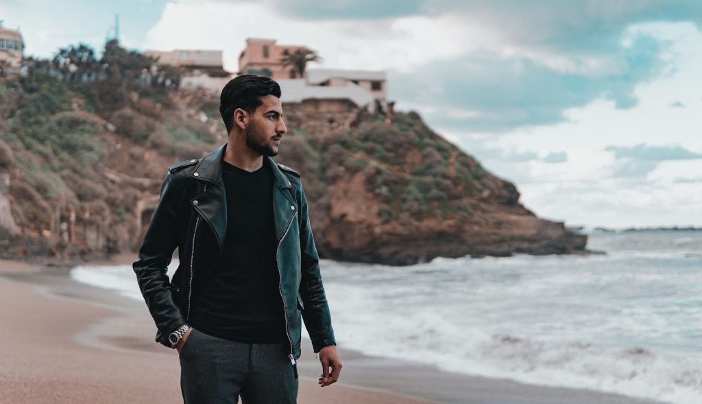 A man wearing a leather jacket.