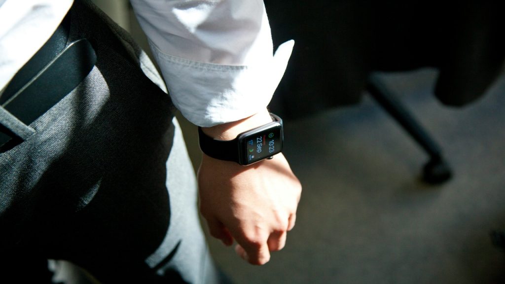 A person wearing a smartwatch.
