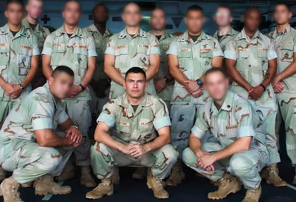 Antonio Centeno kneeling in military group photo