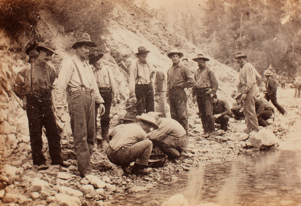 Gold rush miners wearing early workwear denim jeans outdoors