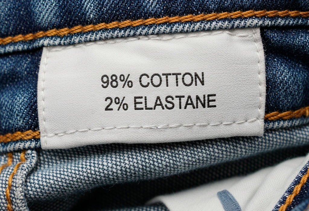 Clothing label showing denim blend of cotton and elastane.